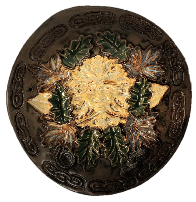 a green man plaque