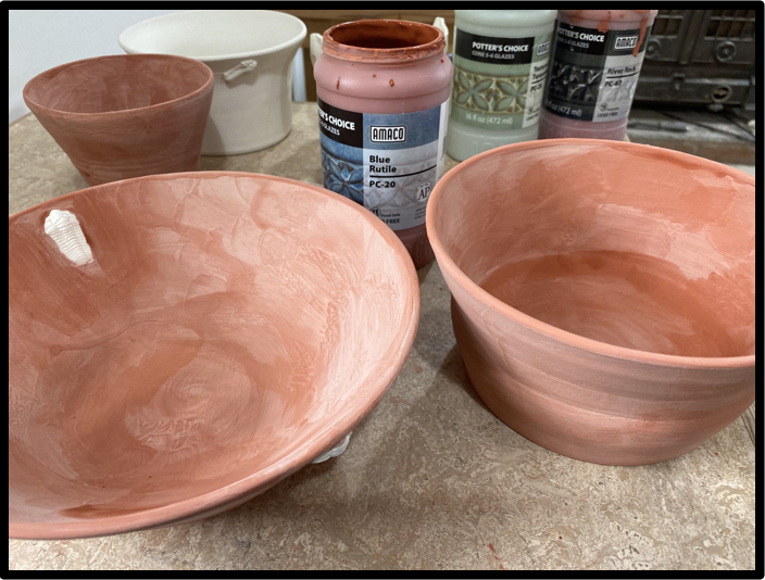 pots ready for firing