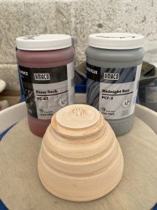 upturned pot with some glazes